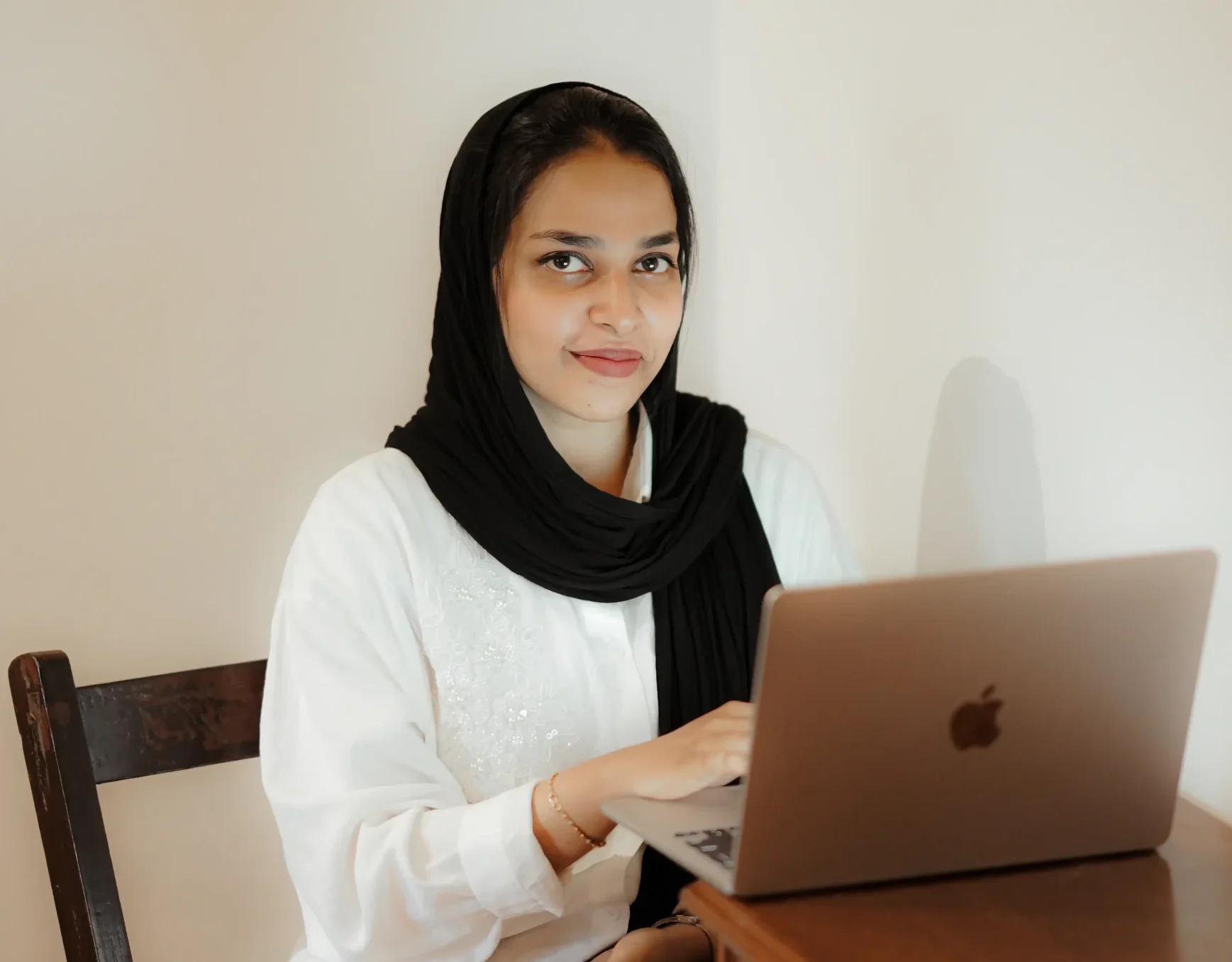 freelance digital marketing analyst working on a laptop